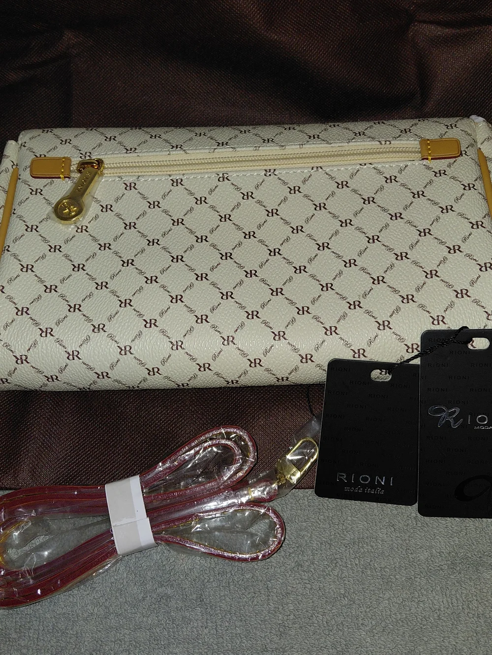 Rioni Cream Monogram Clutch with Gold Emblem